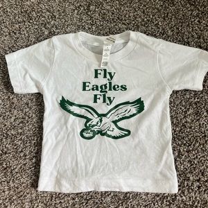 Lightly worn Fly Eagles Fly 6-12 month t-shirt.